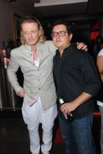Rohit Bal & Vivek Parikh at the unveiling of Maxim_s Best covers of the year in Florian, New Delhi on 27th Aug 2011.JPG